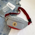 Modern crossbody chest bag in gray canvas with red adjustable strap and accents - Gray
