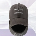Close-up of THICK THIGHS embroidery on washed charcoal grey cotton baseball cap - One Size / Coffee