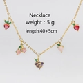 Collar dorado con dijes de frutas en circón colorido, fresa y cereza, largo 40+5cm - Collar de Frutas Mixtas Dorado