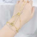 Golden butterfly hand harness bracelet with mother of pearl and pearls on model hand - Butterfly