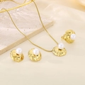 Detailed view of gold plated jewelry set featuring textured discs and white pearls - Wrinkled Disc Pearl Jewelry Collection (KS220720-LX)