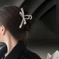 Silver bow metal hair claw clip with mirror finish shown on hair for an elegant look - Minimalist Mirror Bowknot / Large / Silver