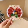 Detail of festive red bow hair clip with white plush trim and colorful pom-poms - 10# Single Christmas Hair Clip (B3626)