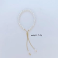 Adjustable pearl bracelet with gold plated beads and sliding clasp weighing 5.1g - 6mm Faux Pearl Bracelet (N065)