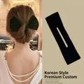 Elegant black velvet bow hair bun maker for women with quick twist styling design - Black