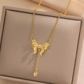 Golden bow heart pendant necklace in titanium steel on a soft jewelry display box - Bowknot Tassel Heart (402 Gold) / Gold