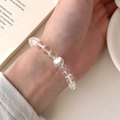 Elegant beaded bracelet with clear crystal beads and a polished silver metal sphere accent - Clear White Crystal Silver Bead (MY36849)