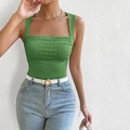 Close-up of green ribbed knit tank top with square neck and slim fit on a model - S / Green