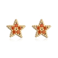 Detailansicht der 18K vergoldeten Stern-Ohrstecker mit leuchtend orangefarbenen Zirkonia - Pentagramme / Orange