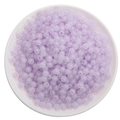Lavender acrylic beads in a white bowl for DIY necklace and jewelry making - Frosted Purple Round Beads