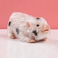 Spotted realistic silicone baby pig doll with soft white fur and black patches - Spotted Pig with Rooted Hair 175g