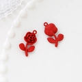 Matte red rose flower pendants for DIY jewelry making displayed on a white plate - 26# Red Rose
