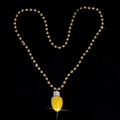 Golden bead necklace with yellow translucent light bulb pendant on dark background - Yellow Bulb Bead Necklace