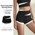 Pantaloncini yoga donna a vita alta a V con design bicolore bianco e nero snellente - S / Nero Stellato