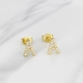 Elegant gold letter A stud earrings with white zircon stones on marble background - Letter A