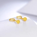 Macro shot of minimalist matte gold ball stud earrings with detailed sandblasted finish - 3mm Gold Frosted 9-Shape (Single)