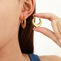 Chic 18k gold plated stainless steel teardrop heart earrings on a female model - Golden Smooth Hoop