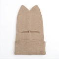 Macro detail of camel knit cat ear balaclava showing soft ribbed texture and warm design - Camel