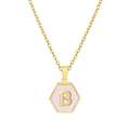 Detailed view of hexagonal gold pendant with pink enamel and letter B on a slim chain - Pink Shell B
