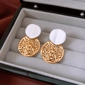 Detail of 18k gold plated hollow circular earrings presented in a dark jewelry gift box - Gold Plated (925 Silver Needle)
