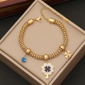 Goldenes Edelstahl-Perlenarmband mit Kleeblatt-Anhängern und blauem Auge der Medusa - Schwarz-Weißes Kleeblatt Böser Blick Stil (2#)