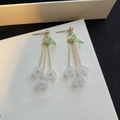 Detail of white frosted lily of the valley earrings with gold fringe and green leaf accents - E6648/925 Sterling Silver Earring Post Lily of the Valley Triple Tassel