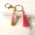 Pink resin initial keychain with gold flakes and matching pink tassel on gold ring - Letter I