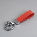Red suede leather car keychain with silver D-ring hardware and stylish stitching detail - Red/Silver