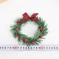 Detailed size measurement of a 12cm Christmas wreath with red berries and plaid bow - 10 Berries / Red & Black Plaid Bowtie