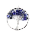 Detailed close-up of Tree of Life pendant with blue crystal stones and silver wire wrap - 3cm / Silver + Lapis Lazuli