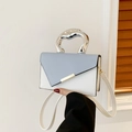 Blue and white color block crossbody bag with silver artistic metal handle - Blue