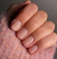 Macro shot of glossy nude pink jelly almond nails on a pink knitted background - Nude Pink Jelly Texture Style (CW365)