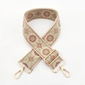 Close-up of ethnic floral embroidery on a wide beige replacement shoulder bag strap - Beige-Light Green Nude Pink Flower