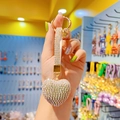 Golden heart keychain with sparkling clear rhinestones and tassel decoration - White Heart