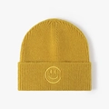 Bright yellow knitted beanie with a matching embroidered smiley face on the ribbed cuff - One Size / Ginger Yellow
