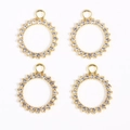 Detail of four gold-plated round pendants with sparkling micro-pave rhinestones for jewelry DIY - Gold Smooth Hoop
