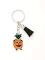 Detailed view of Halloween keychain with black cat in pumpkin suit and black tassel - Black Cat (20621)