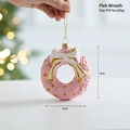 Pink Christmas wreath ornament with gold bow detail and festive golden hanging string - Pink Garland