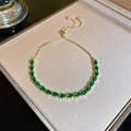 Gold plated bracelet featuring green emerald-cut cubic zirconia with adjustable pull chain - Style 4# Bracelet-Green (4899680933112)