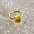 Detail of gold stainless steel ring featuring a square yellow zircon stone inlay - Gold Base: Nov-Golden Yellow