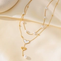 Double-layered gold necklace featuring white pearls and a heart-shaped shell pendant - H1224 Double Heart Shell Pearl Layered Necklace Gold