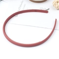 Matte brick red wide headband with anti-slip teeth on vintage book background - Orange Red