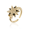 Macro detail of 18K gold-plated starburst ring with black enamel and white zircon stones - Black