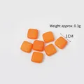 Miniature orange PVC fruit slice toy for DIY crafts weighing 0.3g and measuring 1cm - Grapefruit Style