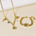 Golden jewelry set featuring chunky chain necklace and bracelet with blue evil eye charms - Necklace + Bracelet