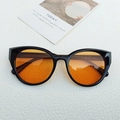 Retro women's cat eye sunglasses with glossy black frame and vibrant orange lenses - Black Frame Orange Lens