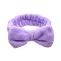 Detail of plush lavender coral fleece headband with soft bow for washing face - Purple