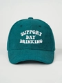 Detail of white Support Day Drinking embroidery on dark green corduroy baseball cap - Dark Green