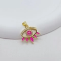 Pink evil eye charm with gold plating and zircons displayed on a white stand - Style 2-Pink Tassel Eye