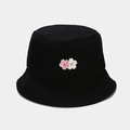 Detail of pink and white cherry blossom embroidery on a black cotton bucket hat - M (56-58cm) / Black